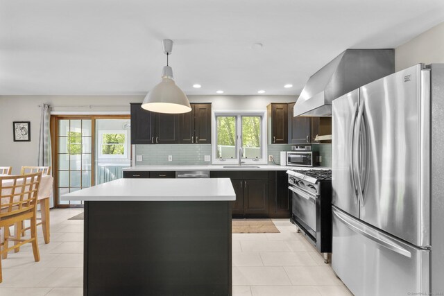200 Sachem Head Rd, Guilford, CT 06437 - kitchen with appliances with stainless steel finishes, a sink, light countertops, decorative backsplash, and light tile patterned flooring