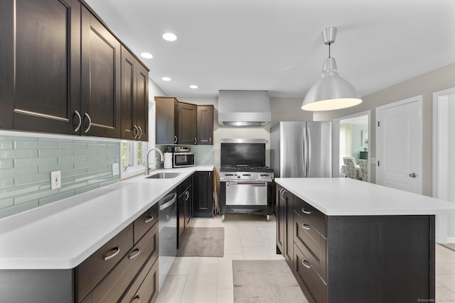 200 Sachem Head Rd, Guilford, CT 06437 - kitchen featuring stainless steel appliances, a sink, decorative backsplash, wall chimney exhaust hood, and recessed lighting