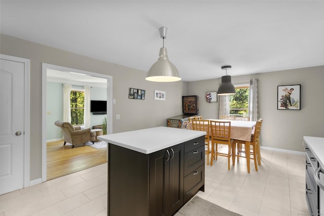 200 Sachem Head Rd, Guilford, CT 06437 - kitchen with light countertops, healthy amount of natural light, decorative light fixtures, and baseboards