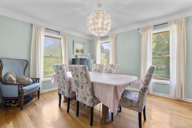 200 Sachem Head Rd, Guilford, CT 06437 - dining room featuring healthy amount of natural light, light wood finished floors, and ornamental molding