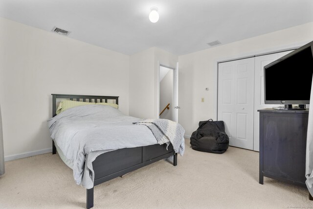 200 Sachem Head Rd, Guilford, CT 06437 - carpeted bedroom featuring a closet and baseboards