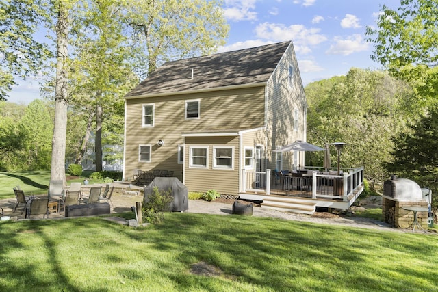 200 Sachem Head Rd, Guilford, CT 06437 - rear view of property featuring a wooden deck and a yard