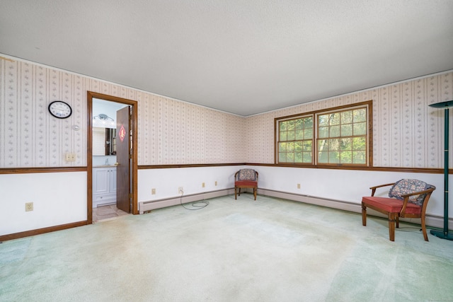 unfurnished room featuring carpet flooring and wallpapered walls
