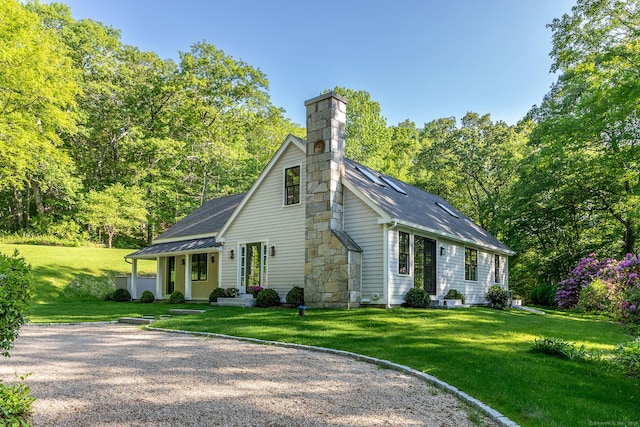 24 Tompkins Hill Rd, Washington, CT 06793 - view of front of property featuring a chimney, a front lawn, and a shingled roof