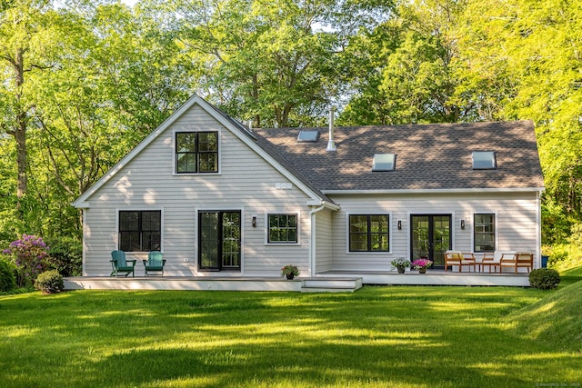 24 Tompkins Hill Rd, Washington, CT 06793 - back of property with a lawn, a wooden deck, and roof with shingles