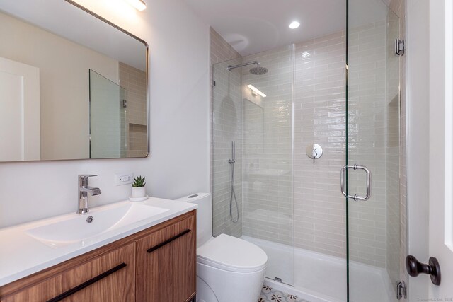 24 Tompkins Hill Rd, Washington, CT 06793 - bathroom featuring toilet, vanity, and a stall shower