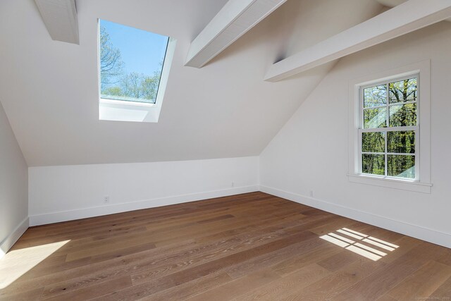 24 Tompkins Hill Rd, Washington, CT 06793 - bonus room with hardwood / wood-style floors, lofted ceiling, baseboards, and a skylight