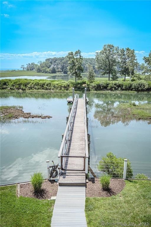 dock area featuring a water view
