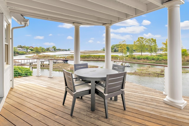 29 Covelee Dr, Norwalk, CT 06855 - wooden deck featuring a water view and outdoor dining space