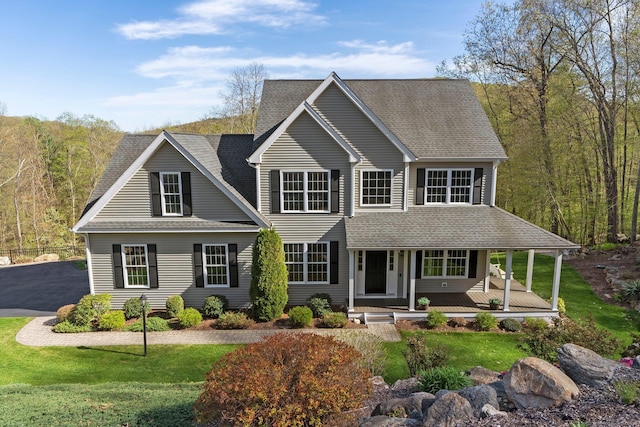 5 Shire Way, Burlington, CT 06013 - view of front facade with a porch, a front yard, and roof with shingles