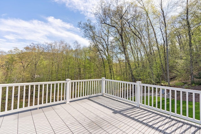 wooden terrace with a forest view
