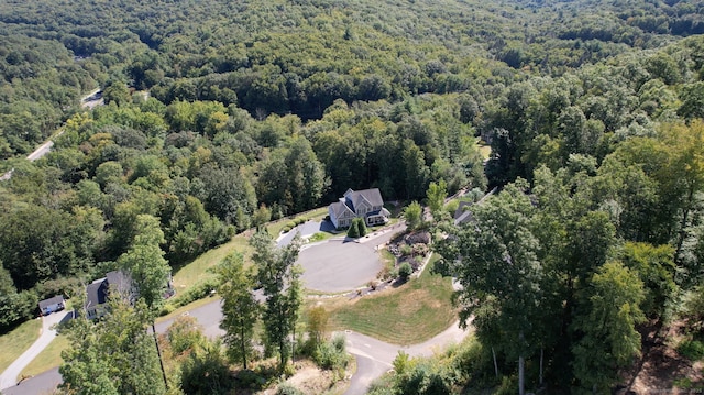 aerial view with a wooded view