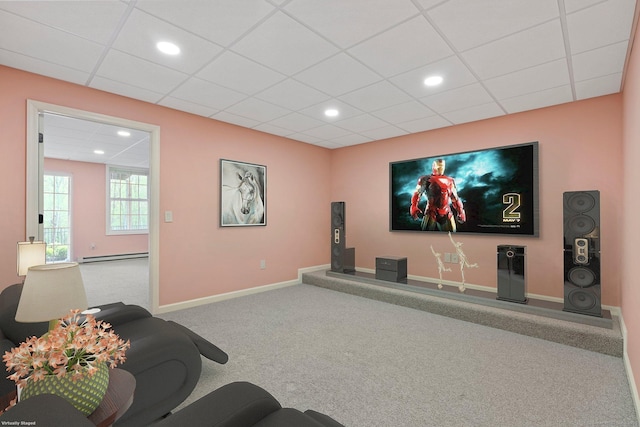 cinema with carpet floors, a baseboard radiator, baseboards, a drop ceiling, and recessed lighting
