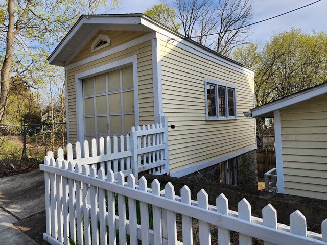 129 Walnut St, Windham, CT 06226 - exterior space featuring fence private yard and an outbuilding