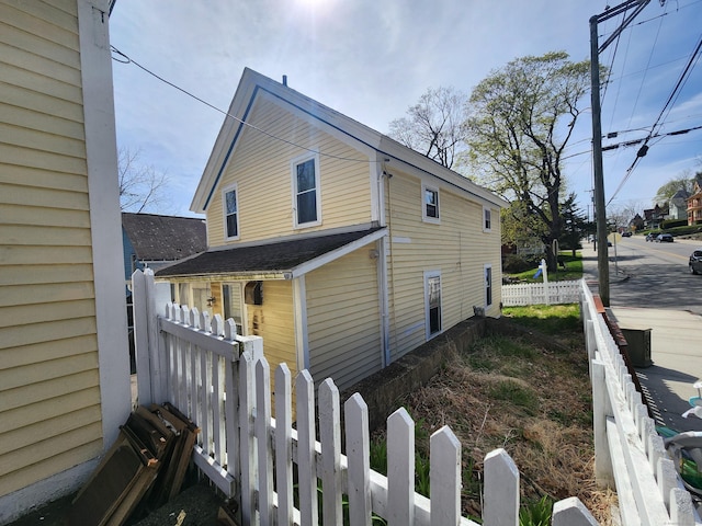 129 Walnut St, Windham, CT 06226 - view of home's exterior with fence