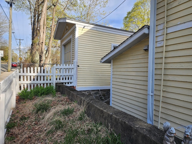 129 Walnut St, Windham, CT 06226 - view of side of home featuring fence