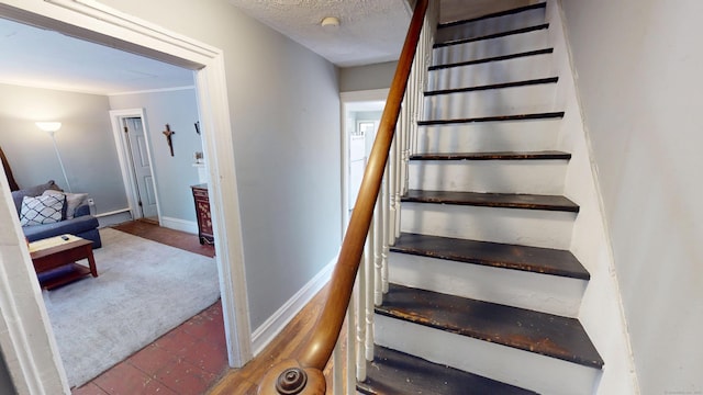 129 Walnut St, Windham, CT 06226 - stairway featuring baseboards