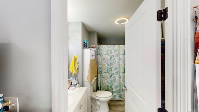 129 Walnut St, Windham, CT 06226 - full bath featuring vanity, toilet, and a shower with shower curtain
