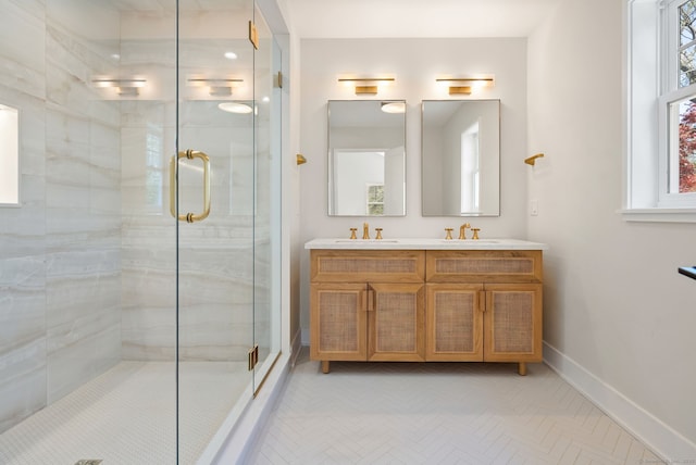 183 Pepperidge Cir, Fairfield, CT 06824 - bathroom with a stall shower, baseboards, and double vanity