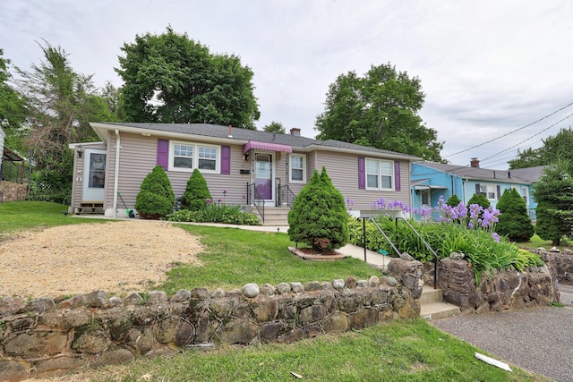 839 Washington Avenue Extension, Waterbury, CT 06708 - view of front of property featuring a chimney and a front yard