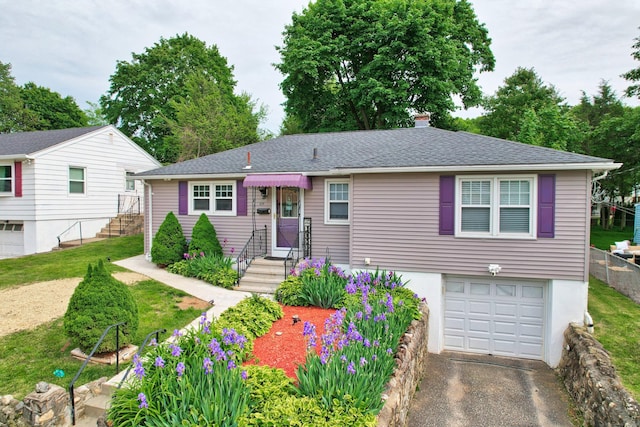 839 Washington Avenue Extension, Waterbury, CT 06708 - view of front of home featuring an attached garage, asphalt driveway, a chimney, and a shingled roof