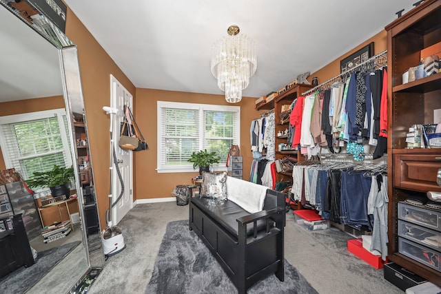 839 Washington Avenue Extension, Waterbury, CT 06708 - walk in closet featuring carpet flooring and a chandelier