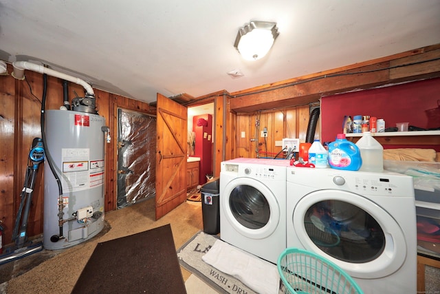 839 Washington Avenue Extension, Waterbury, CT 06708 - laundry room with gas water heater, washer and dryer, and wood walls
