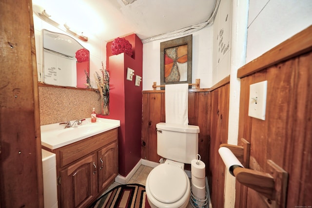 839 Washington Avenue Extension, Waterbury, CT 06708 - bathroom with vanity, toilet, and tile patterned flooring