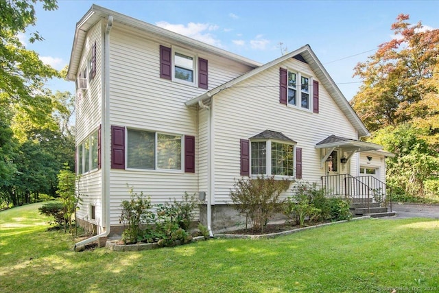 view of front of home featuring a front yard