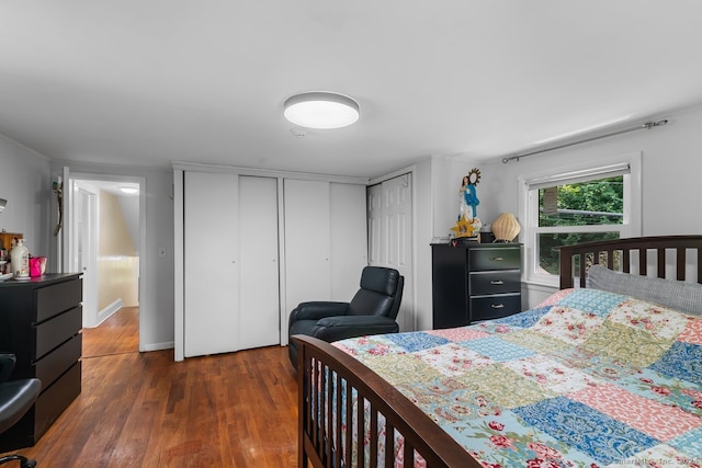 bedroom with wood finished floors