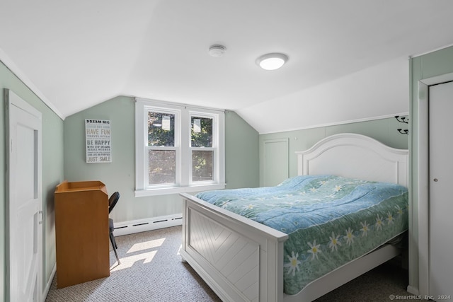 carpeted bedroom featuring a baseboard radiator and vaulted ceiling