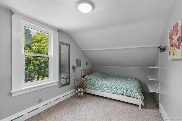 bedroom featuring carpet floors, a baseboard radiator, baseboards, and vaulted ceiling