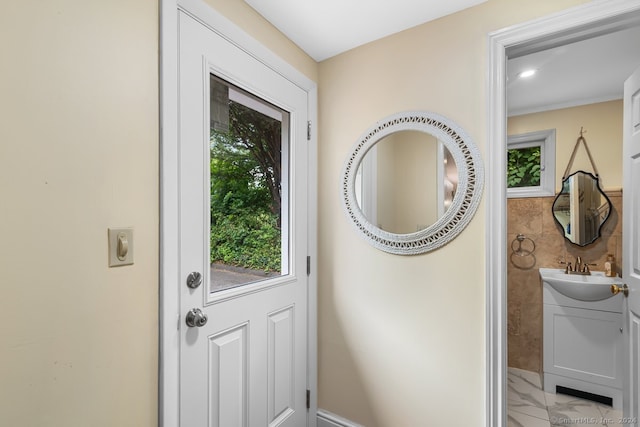 doorway featuring a sink
