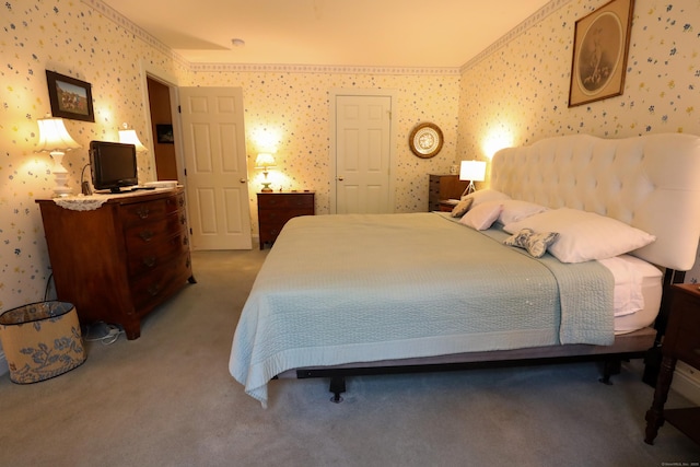 bedroom featuring wallpapered walls and carpet flooring