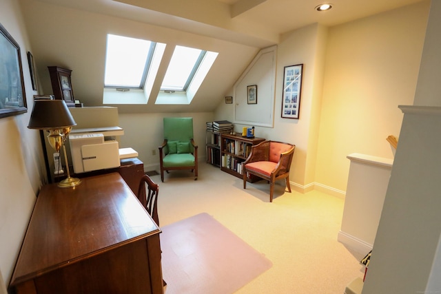 home office featuring a skylight, carpet, recessed lighting, vaulted ceiling, and baseboards