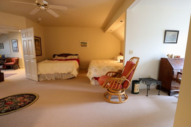carpeted bedroom with lofted ceiling and a ceiling fan