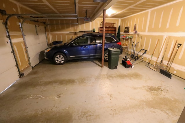 garage featuring a garage door opener