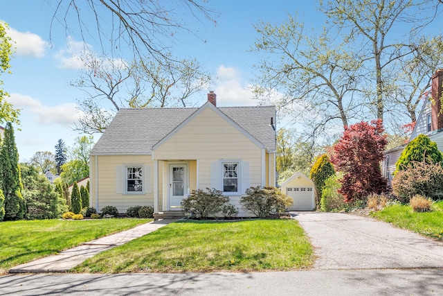 view of front of home featuring a garage, an outdoor structure, a chimney, and a front lawn