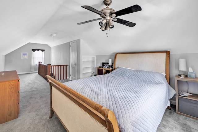 carpeted bedroom featuring a ceiling fan and lofted ceiling