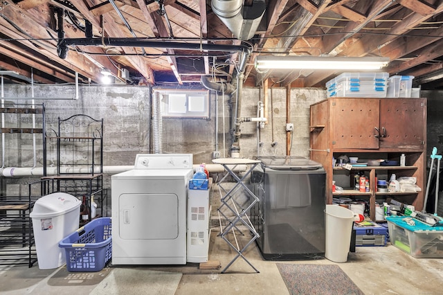 basement featuring separate washer and dryer