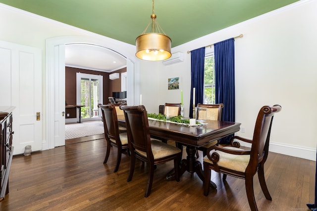 290 Waterville Rd, Avon, CT 06001 - dining area featuring a wall mounted AC, ornamental molding, arched walkways, dark wood-type flooring, and baseboards