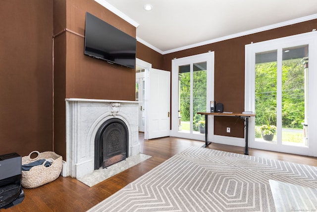 290 Waterville Rd, Avon, CT 06001 - unfurnished living room with wood finished floors, ornamental molding, and a fireplace