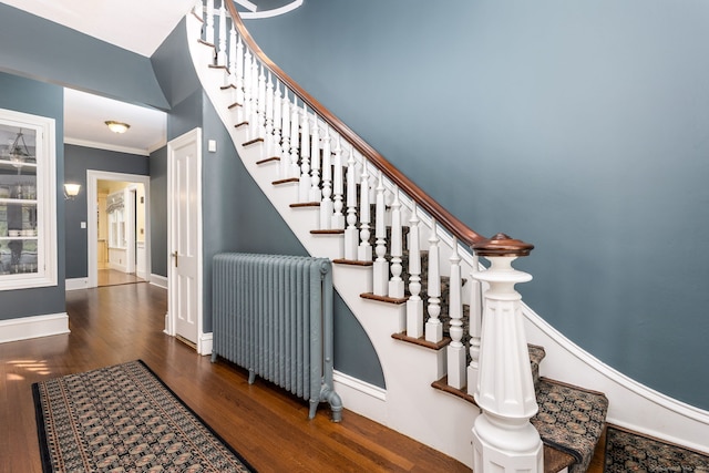 290 Waterville Rd, Avon, CT 06001 - stairway featuring radiator, wood finished floors, baseboards, and crown molding