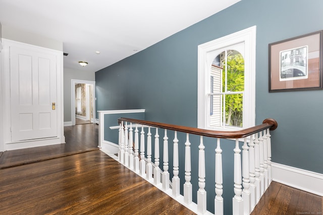 290 Waterville Rd, Avon, CT 06001 - hall featuring an upstairs landing, wood finished floors, and baseboards