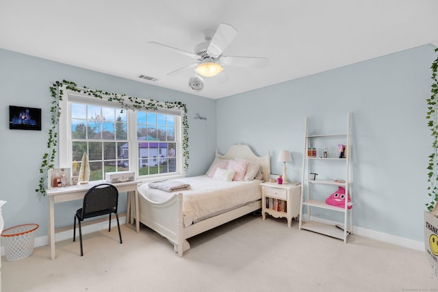 bedroom with baseboards, ceiling fan, carpet flooring, and visible vents