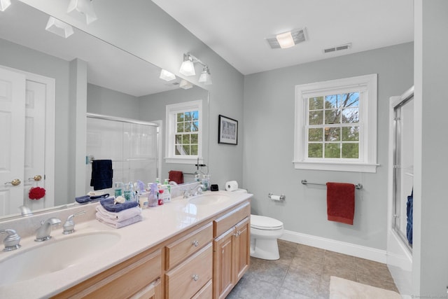 full bath featuring an enclosed shower, visible vents, and a sink