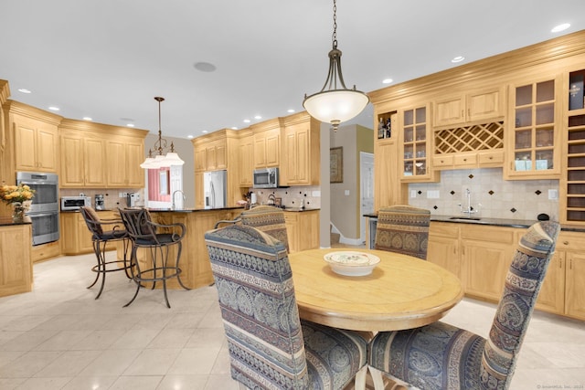 dining room with recessed lighting and light tile patterned flooring