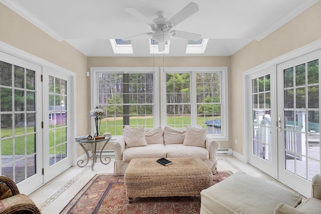 sunroom / solarium with a skylight, french doors, and a baseboard heating unit