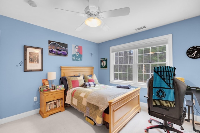 bedroom with visible vents, baseboards, ceiling fan, and light colored carpet