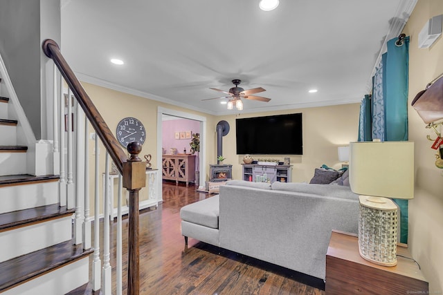 living room with stairway, dark wood finished floors, a ceiling fan, crown molding, and recessed lighting